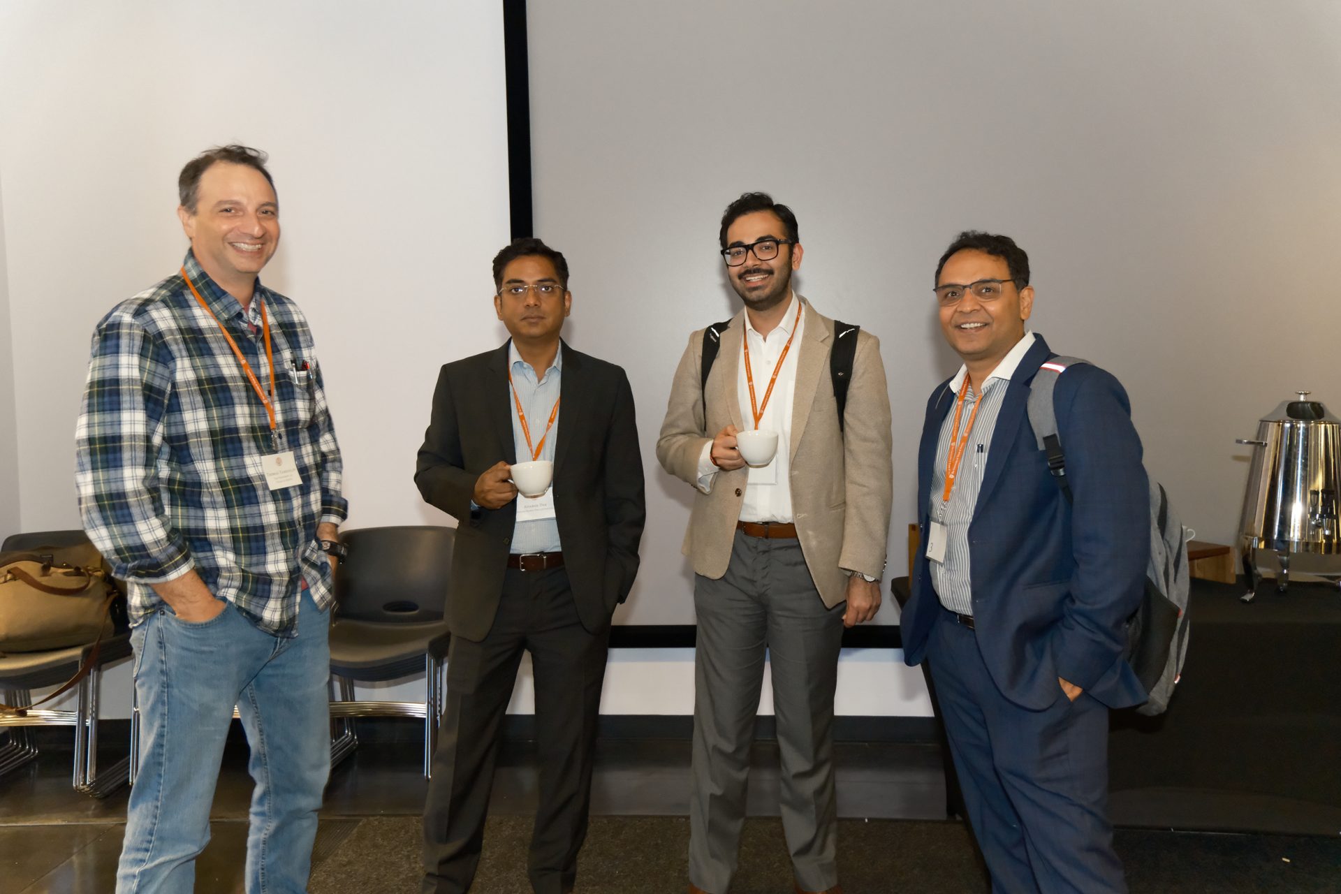 Researchers networking at QxBio 2025